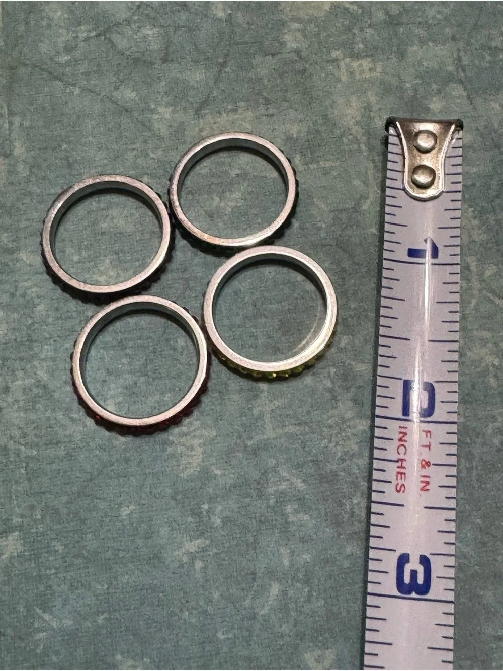 SET OF FOUR STACKABLE STAINLESS STEEL RINGS